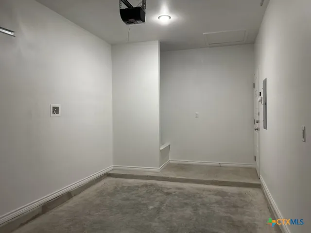 an empty room with a workbench