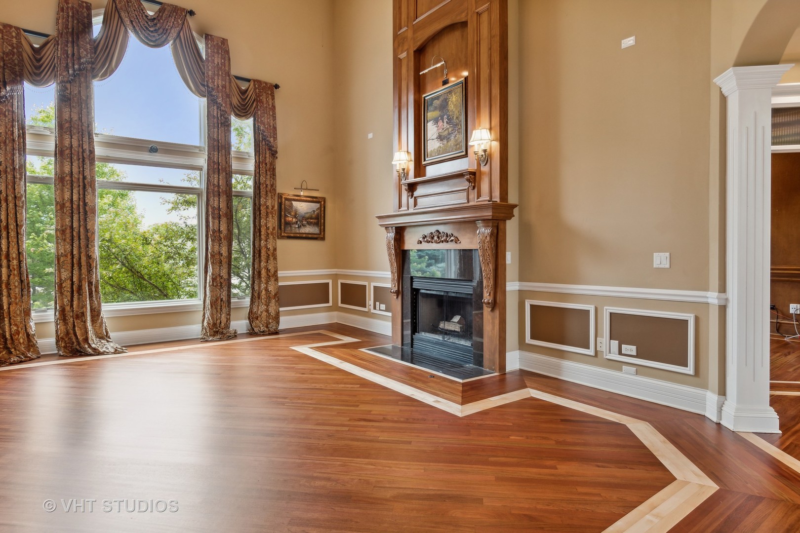 8S287 Hampton Circle Naperville, IL 60540 - Photo 12 of 42 an empty room with wooden floor fireplace and windows
