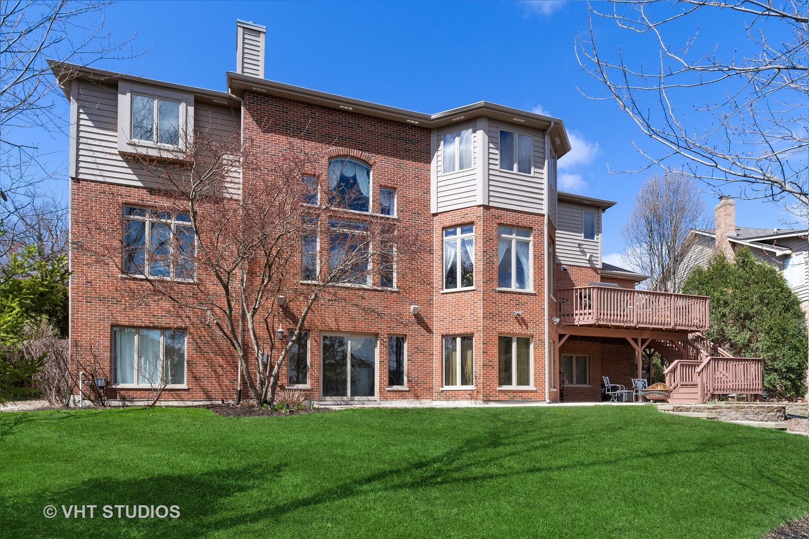 8S287 Hampton Circle Naperville, IL 60540 - Photo 39 of 42 a front view of a building with a garden