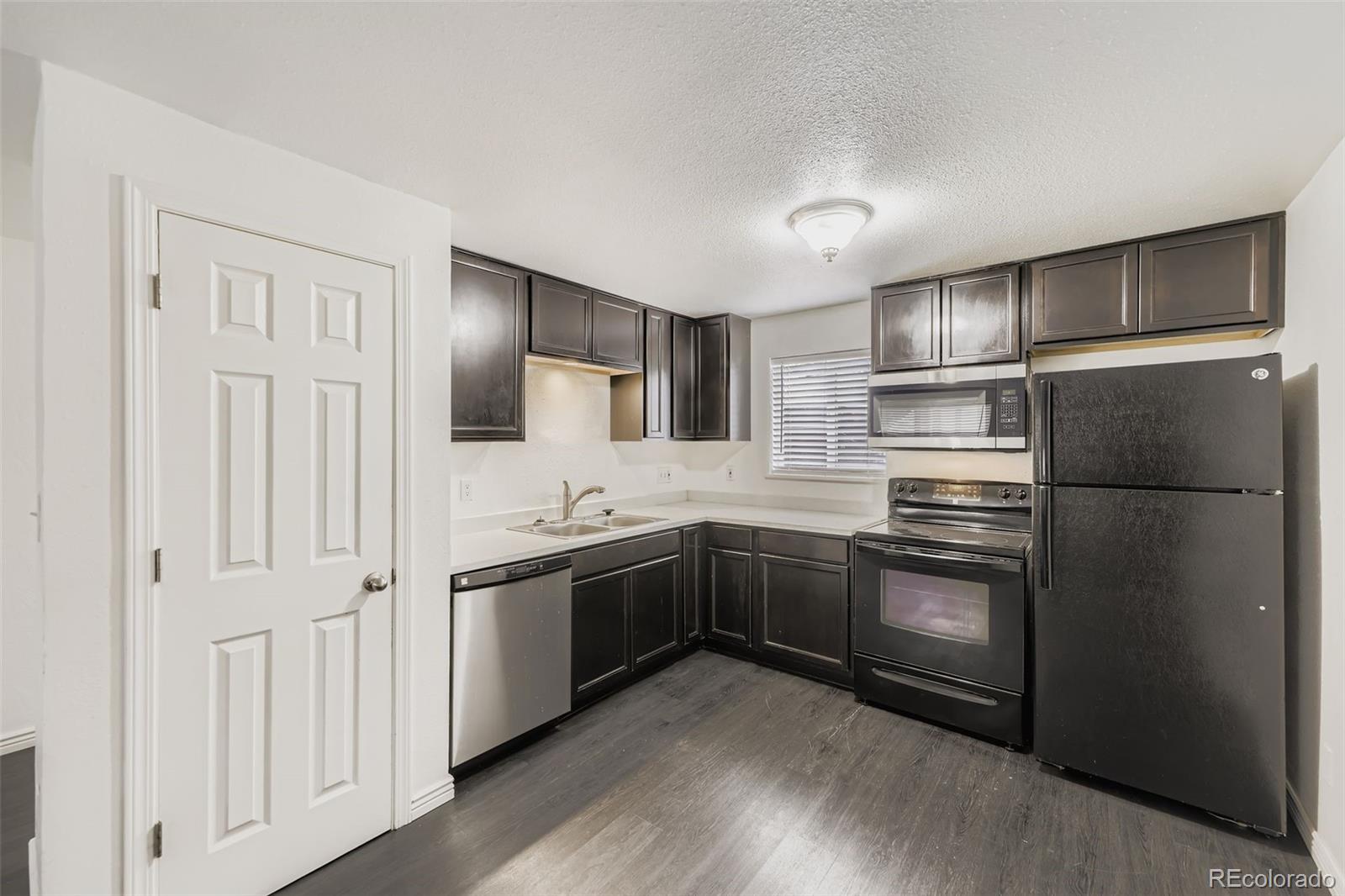 1080 South Eliot Street, Unit 102 Denver, CO 80219 - Photo 3 of 11