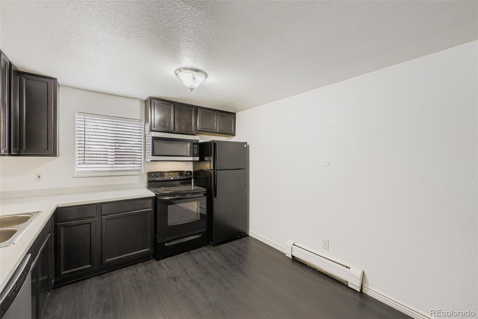 1080 South Eliot Street, Unit 102 Denver, CO 80219 - Photo 4 of 11