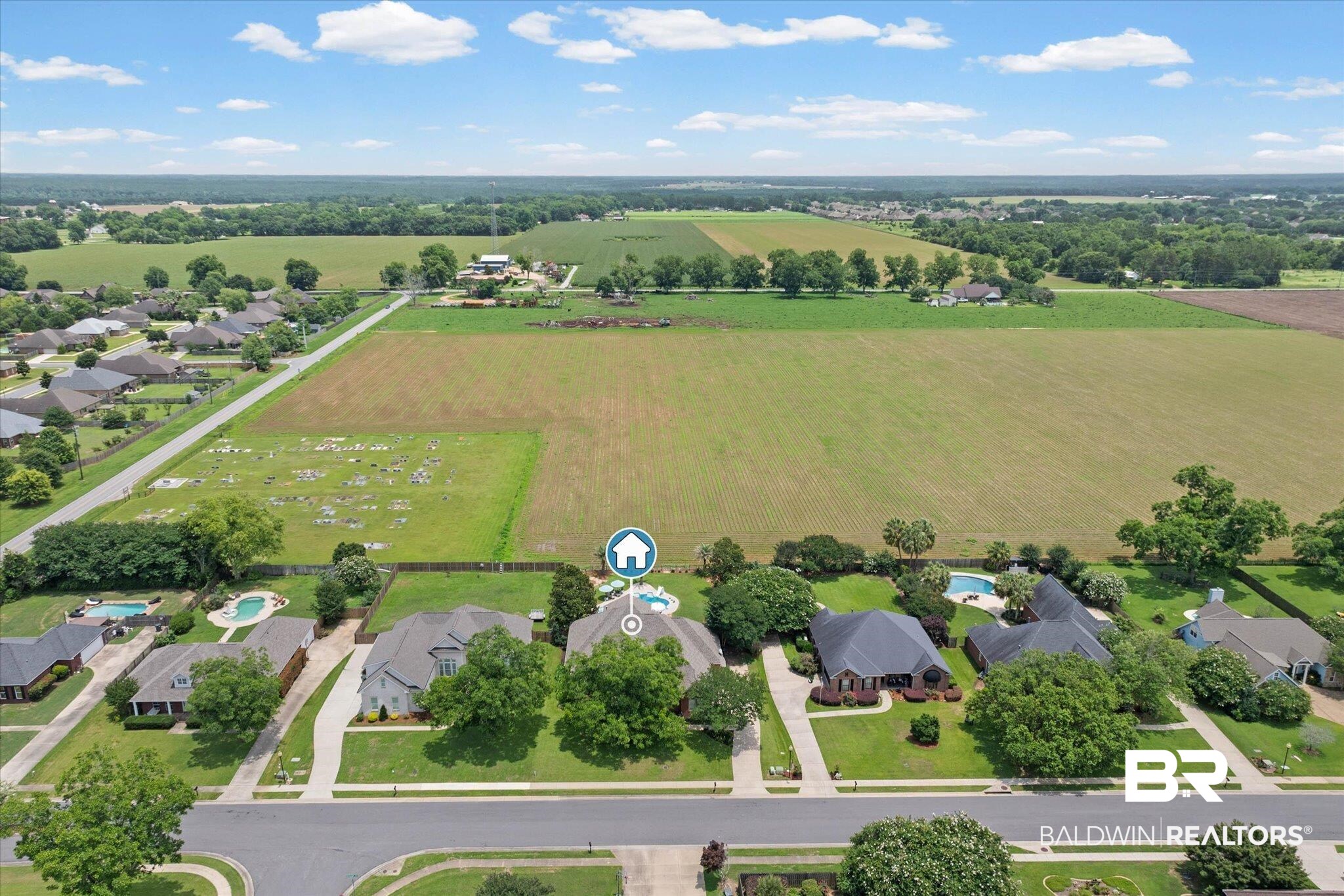24908 Bosbyshell Avenue Daphne, AL 36526 - Photo 35 of 49 Aerial view showcasing a residential neighborhood bordering expansive green fields