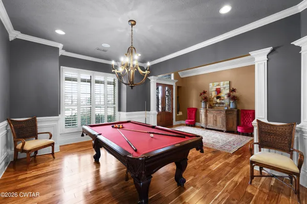 a living room with furniture fireplace and a flat screen tv
