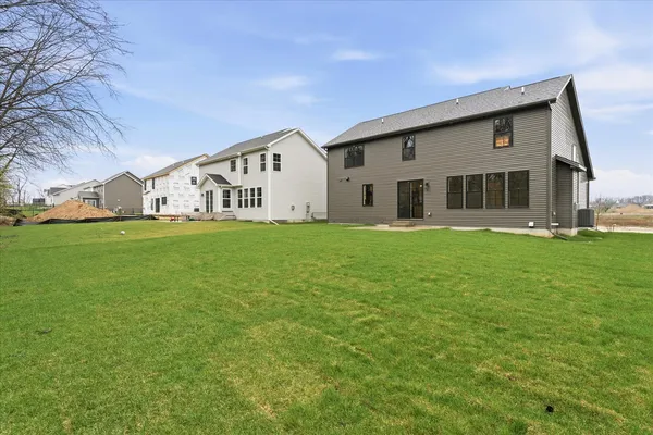 $619,000 | 1403 Ravenwood Drive, Mahomet, IL 61853