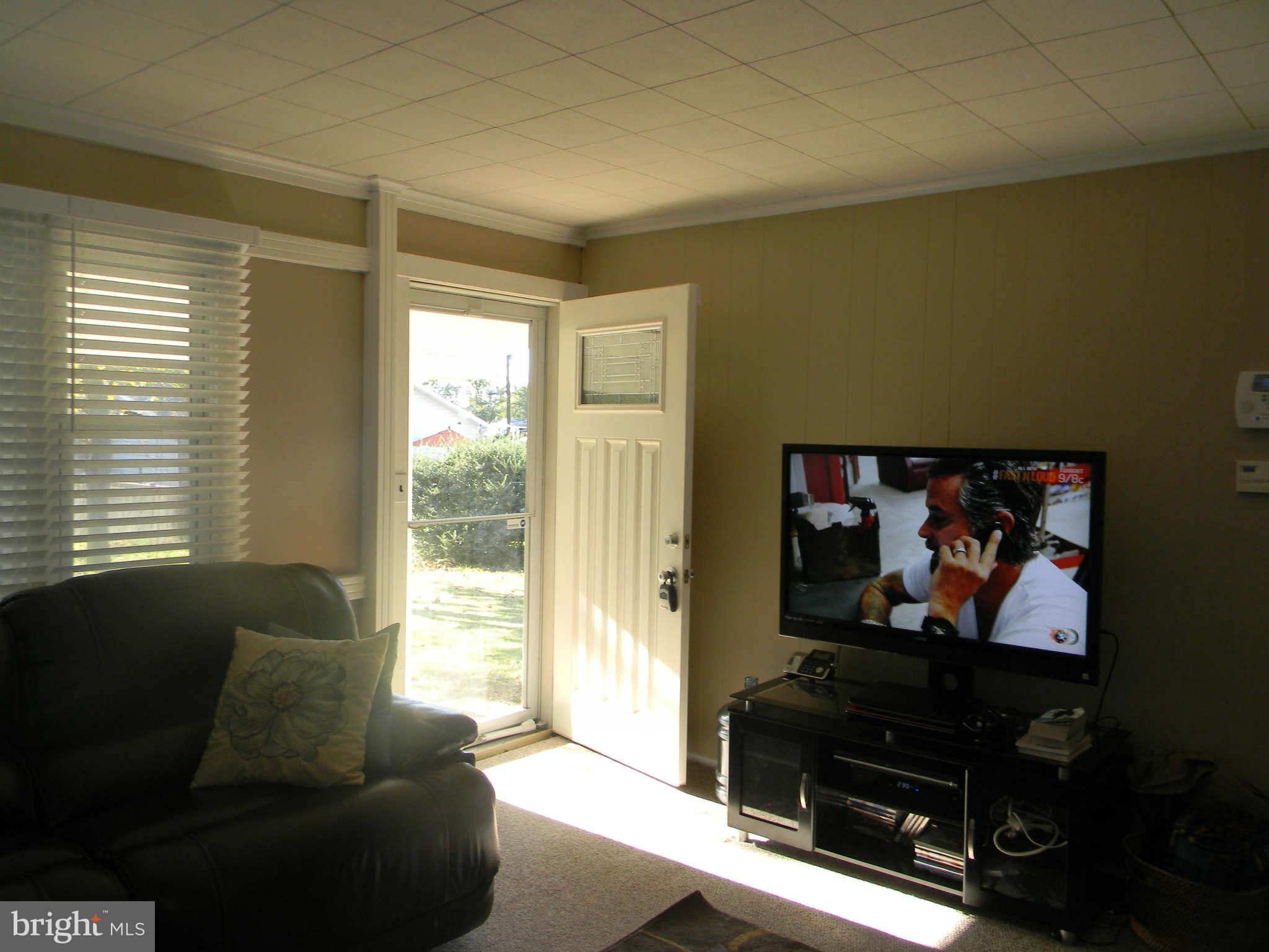 1412 3rd Road Baltimore, MD 21220 - Photo 14 of 18 Living Room Rear Entrance