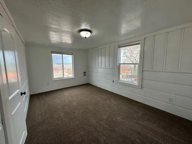 an empty room with windows