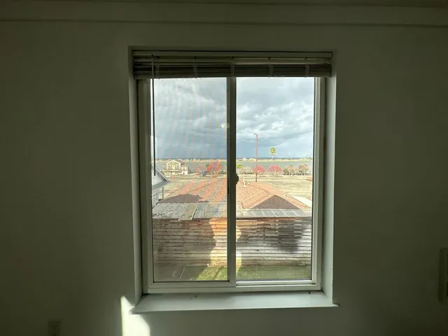 a view of a glass door with a window