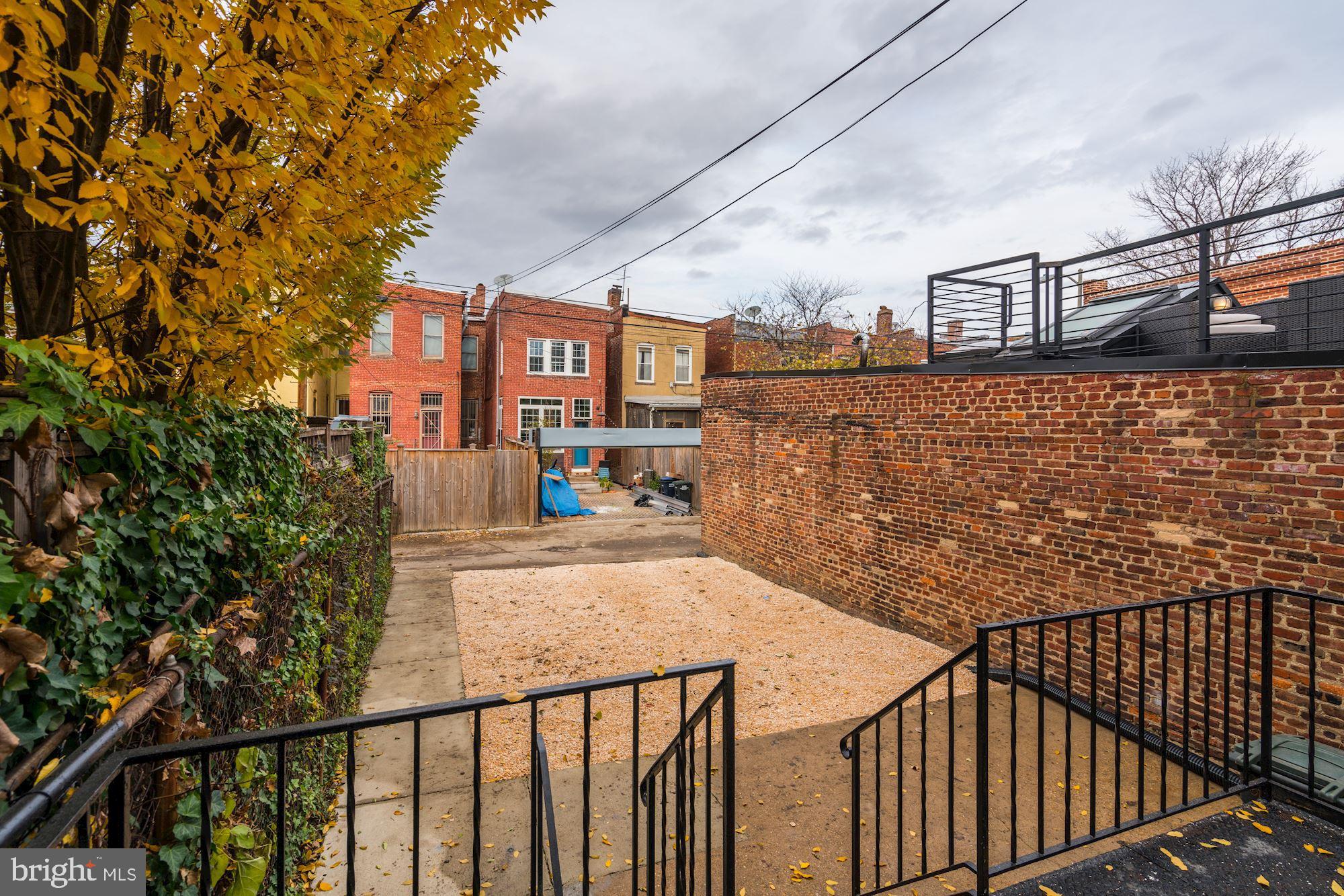 923 R Street Northwest Washington, DC 20001 - Photo 18 of 18 Large Yard w/ Parking & Stunning Exposed Brick