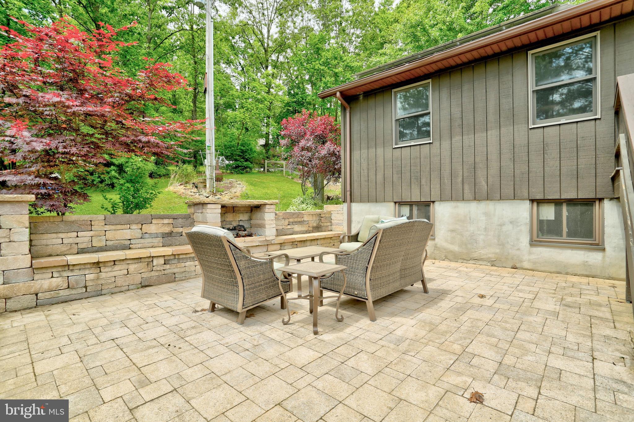19991 Dutton Road Stewartstown, PA 17363 - Photo 18 of 61 Paver patio with built in gas fireplace
