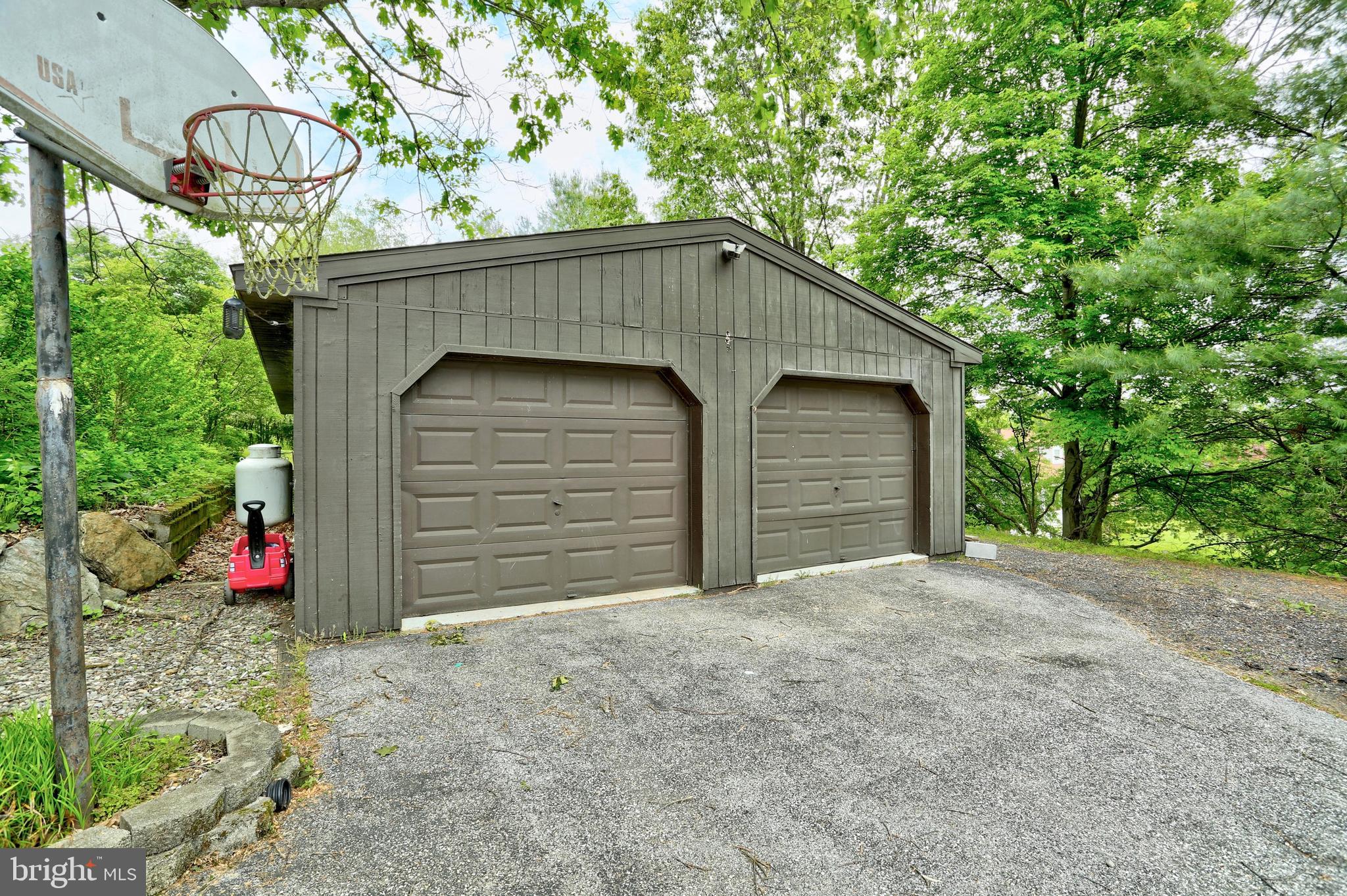 19991 Dutton Road Stewartstown, PA 17363 - Photo 10 of 61 Covered storage area/parking pad behind garage