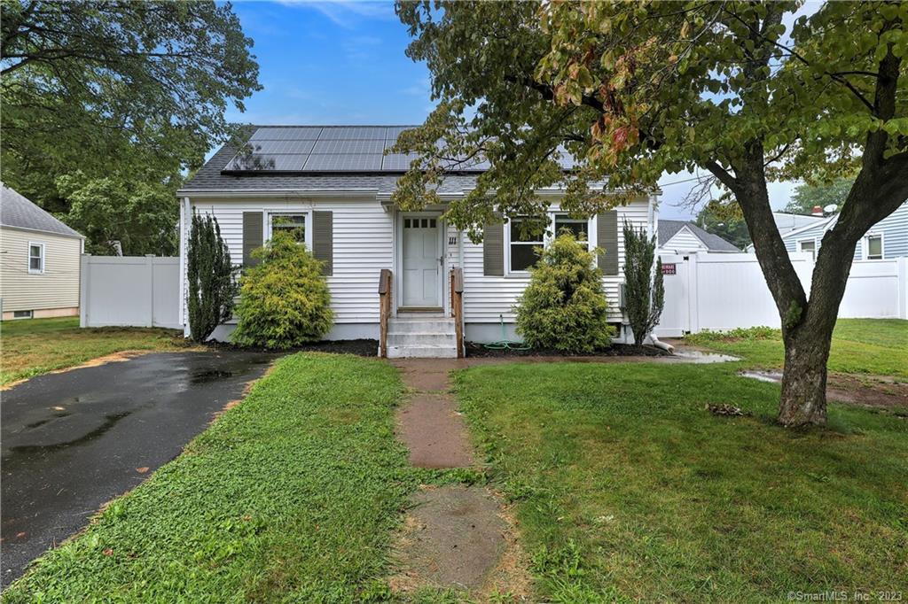 111 Gilbert Avenue Hamden, CT 06514 - Photo 1 of 1 a front view of a house with garden