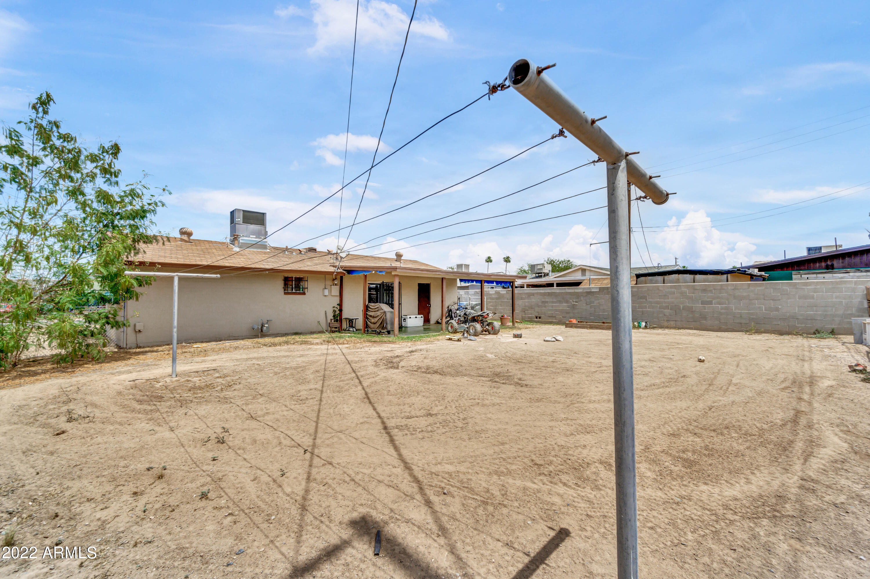 2011 West Pecan Road Phoenix, AZ 85041 - Photo 23 of 25 a front view of a house with a yard
