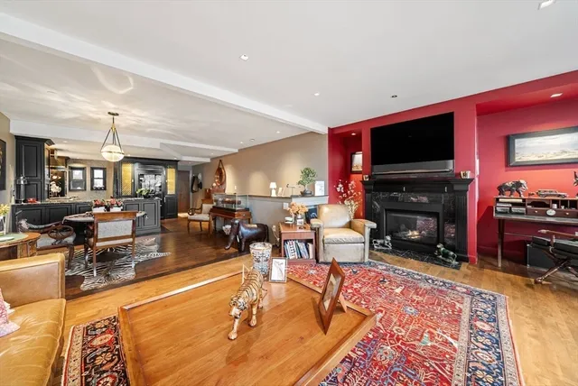 a living room with lots of furniture and a flat screen tv