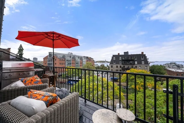 a view of a balcony with couch