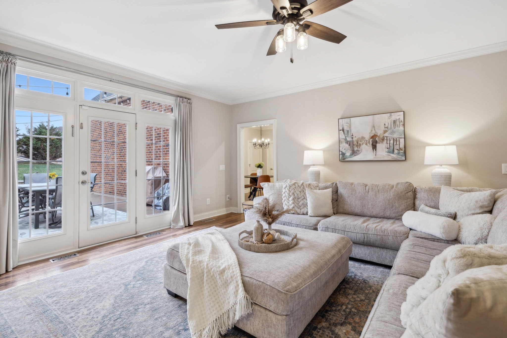 1209 White Rock Road Spring Hill, TN 37174 - Photo 19 of 93 a living room with furniture and a chandelier