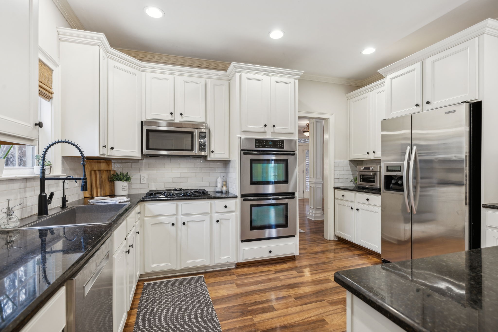 1209 White Rock Road Spring Hill, TN 37174 - Photo 27 of 93 a kitchen with stainless steel appliances granite countertop a refrigerator sink and microwave