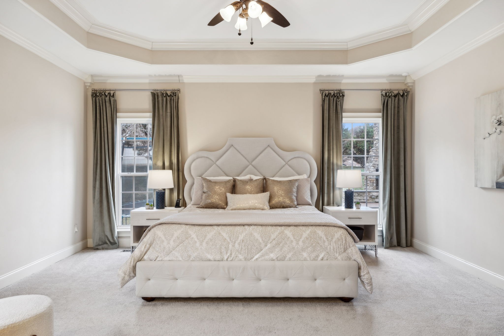 1209 White Rock Road Spring Hill, TN 37174 - Photo 35 of 93 a bedroom with a large bed and a chandelier