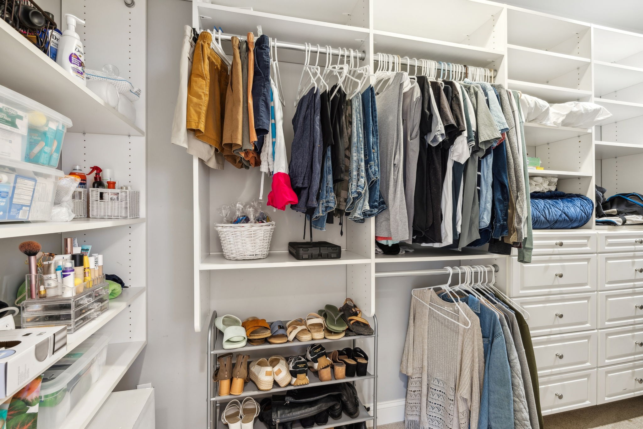 1209 White Rock Road Spring Hill, TN 37174 - Photo 44 of 93 a view of walk in closet with clothes and shoes