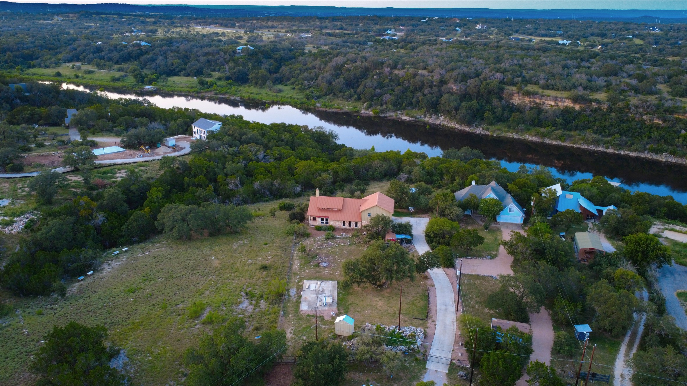an aerial view of house with yard