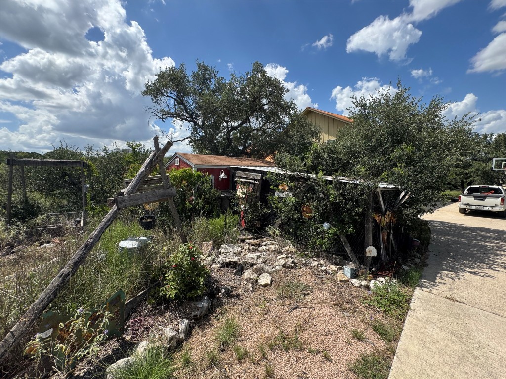 3633 Outback Trail Spicewood, TX 78669 - Photo 16 of 34 a view of street with lots of trees
