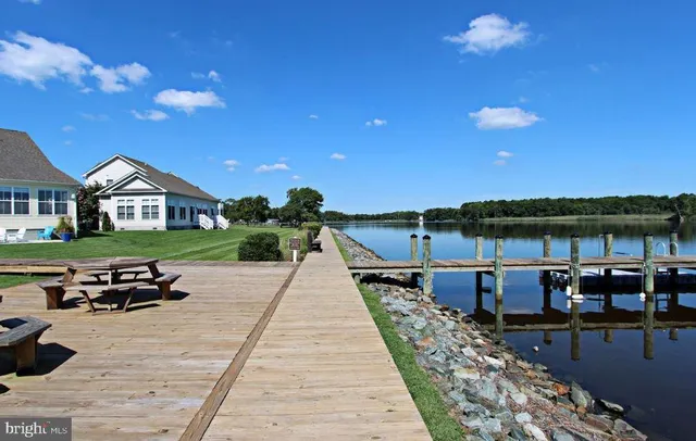 a view of a chairs and table in a terrace