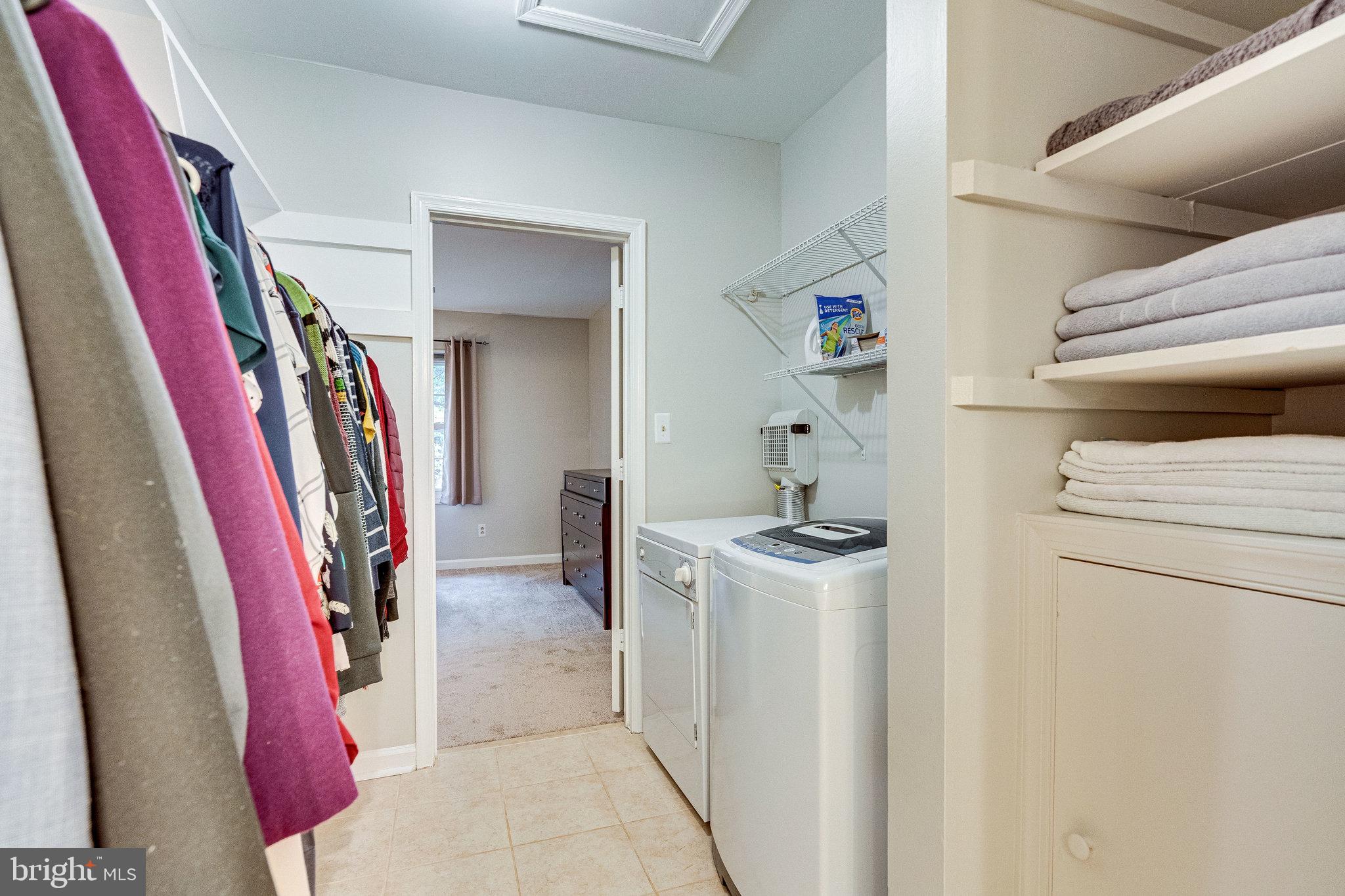 5900 Queenston Street, Unit 497 Springfield, VA 22152 - Photo 13 of 37 Large, walk through closet with laundry!