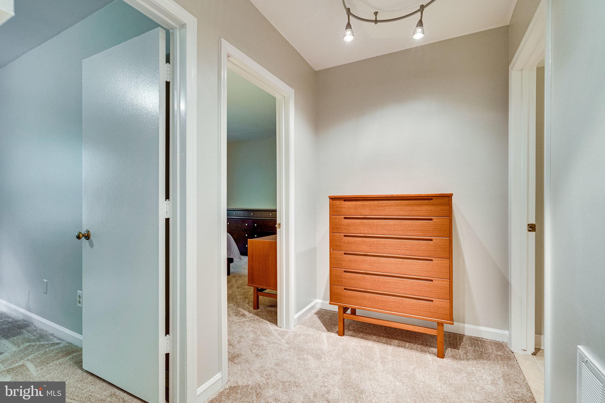 5900 Queenston Street, Unit 497 Springfield, VA 22152 - Photo 8 of 37 Hallway to bedrooms