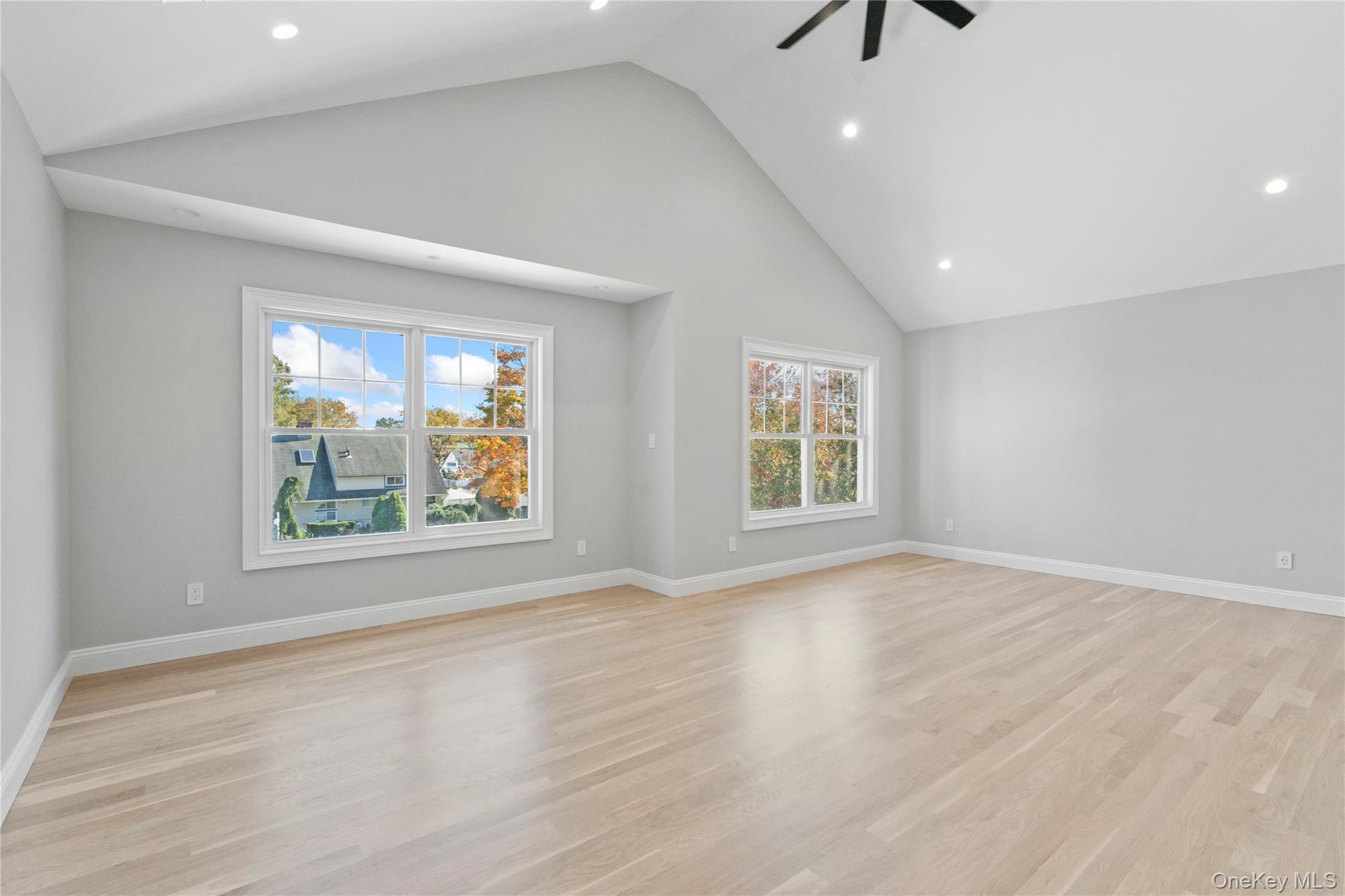 30 Virginia Road Syosset, NY 11791 - Photo 16 of 24 wooden floor in an empty room with a window