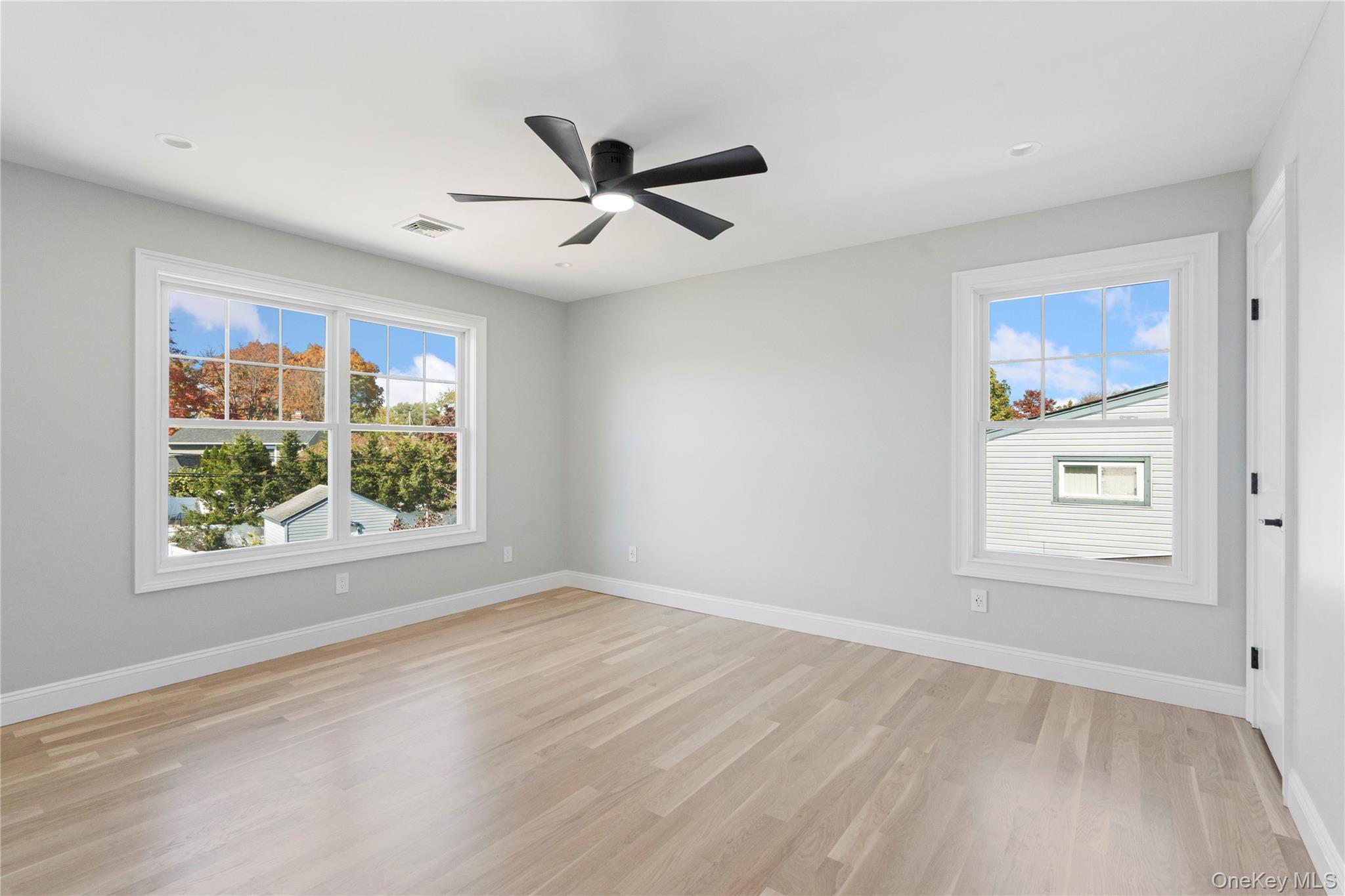 30 Virginia Road Syosset, NY 11791 - Photo 23 of 24 a view of an empty room with a window