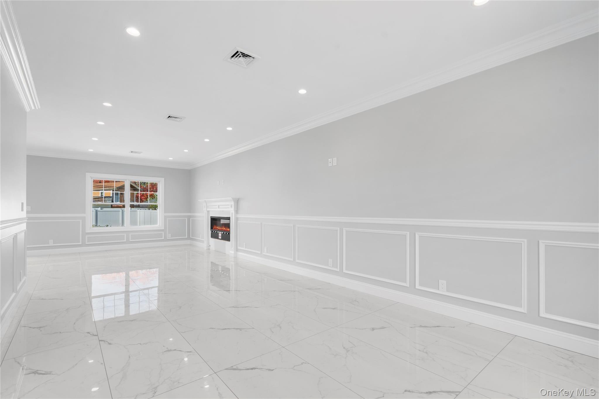 30 Virginia Road Syosset, NY 11791 - Photo 10 of 24 a view of an empty room with a window