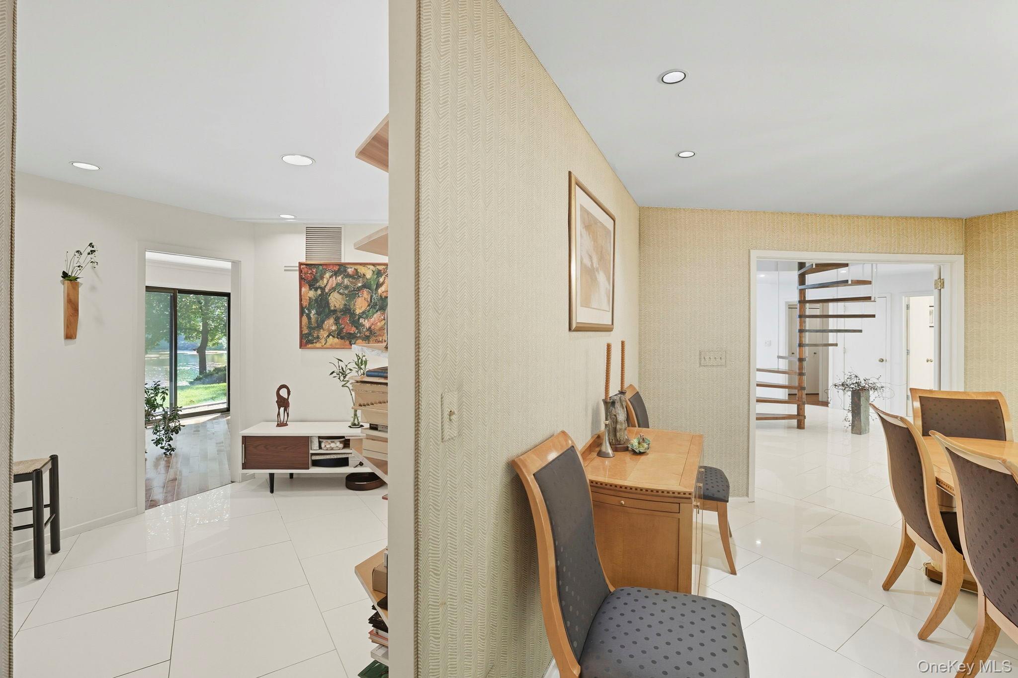 67 Banksville Road Armonk, NY 10504 - Photo 15 of 49 a living room with furniture and a table