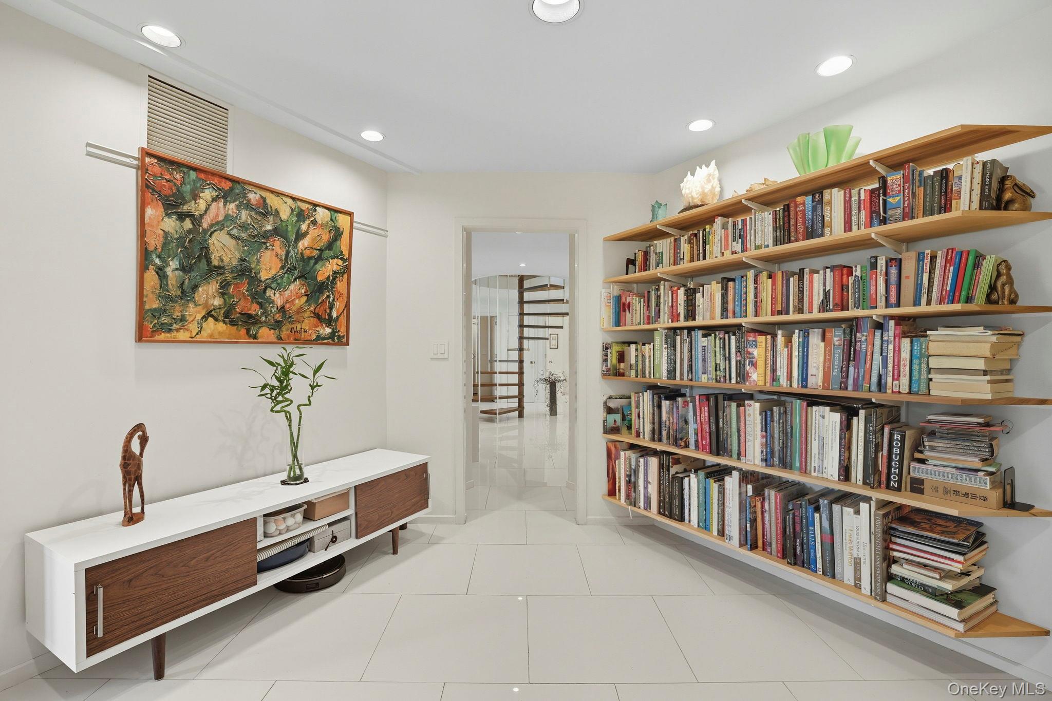 67 Banksville Road Armonk, NY 10504 - Photo 22 of 49 a view of room with furniture book shelf and book shelf