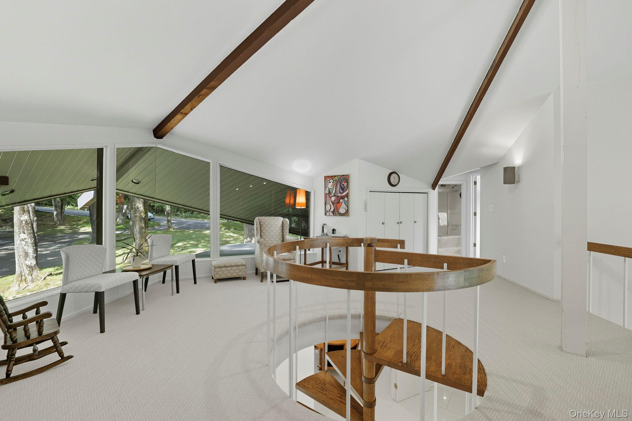 67 Banksville Road Armonk, NY 10504 - Photo 32 of 49 a living room with furniture and a large window