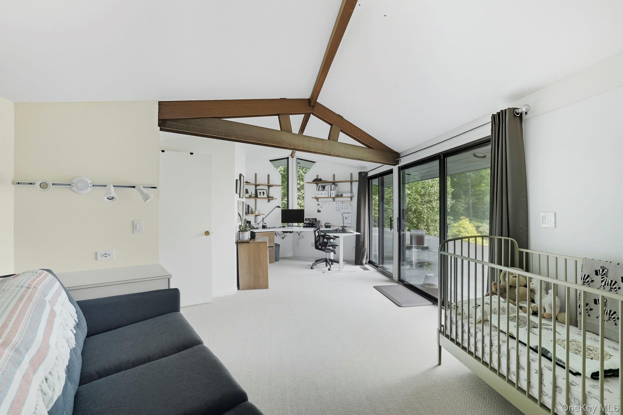 67 Banksville Road Armonk, NY 10504 - Photo 34 of 49 a bedroom with furniture and a window