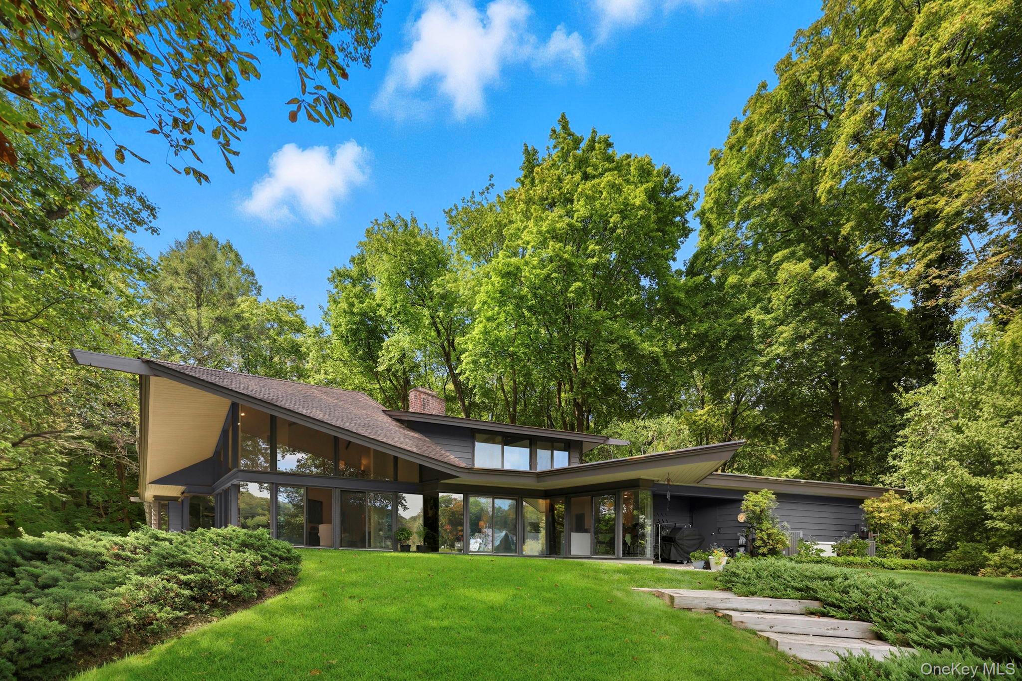 67 Banksville Road Armonk, NY 10504 - Photo 4 of 49 a view of house with a yard