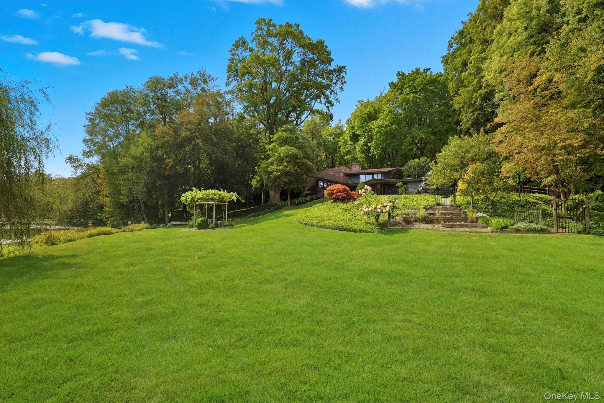 67 Banksville Road Armonk, NY 10504 - Photo 45 of 49 a view of a park with large trees