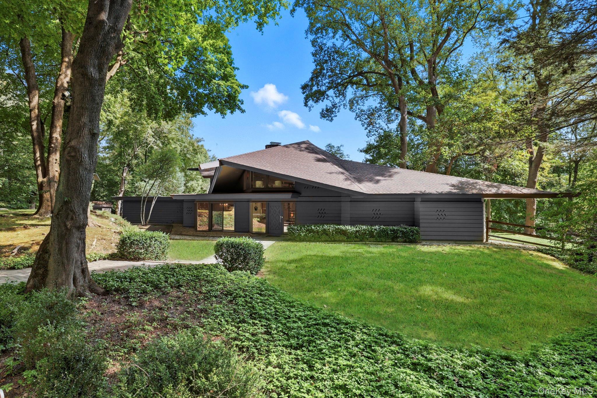 67 Banksville Road Armonk, NY 10504 - Photo 47 of 49 a view of house with a big yard