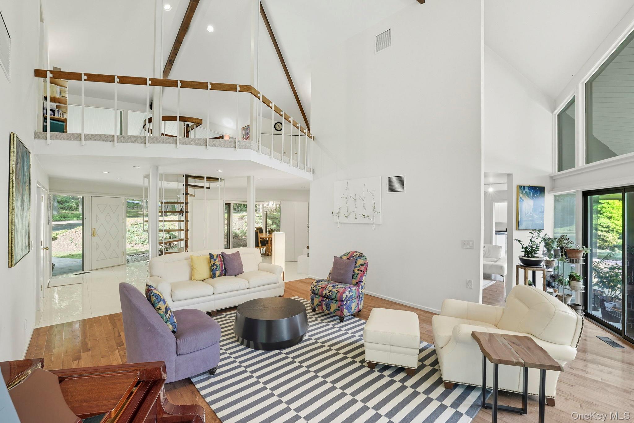 67 Banksville Road Armonk, NY 10504 - Photo 10 of 49 a view of a dining room with furniture window and wooden floor