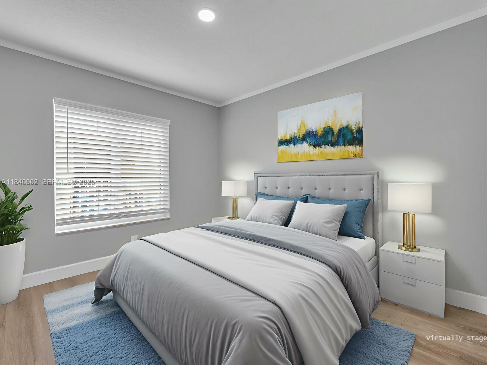 933 Falling Water Road Weston, FL 33326 - Photo 32 of 58 a bedroom with a bed and a painting on the wall