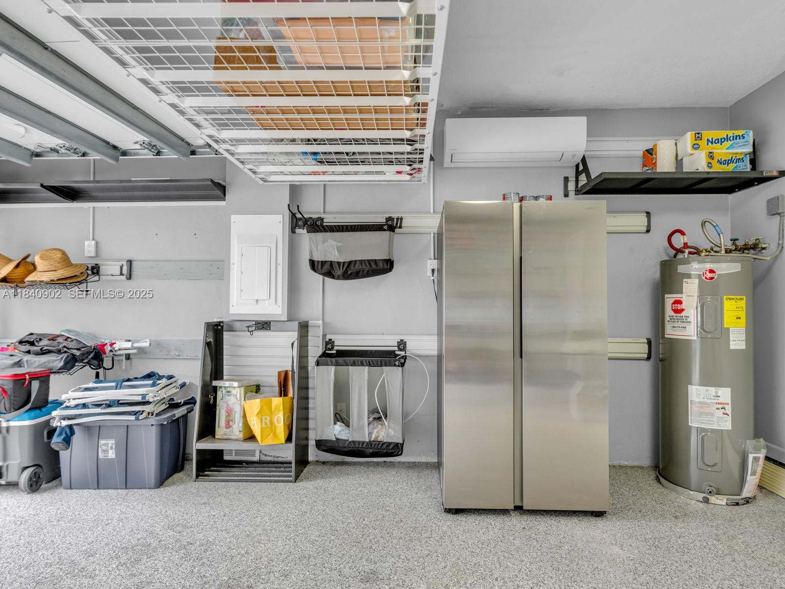 933 Falling Water Road Weston, FL 33326 - Photo 39 of 58 a kitchen with refrigerator and window