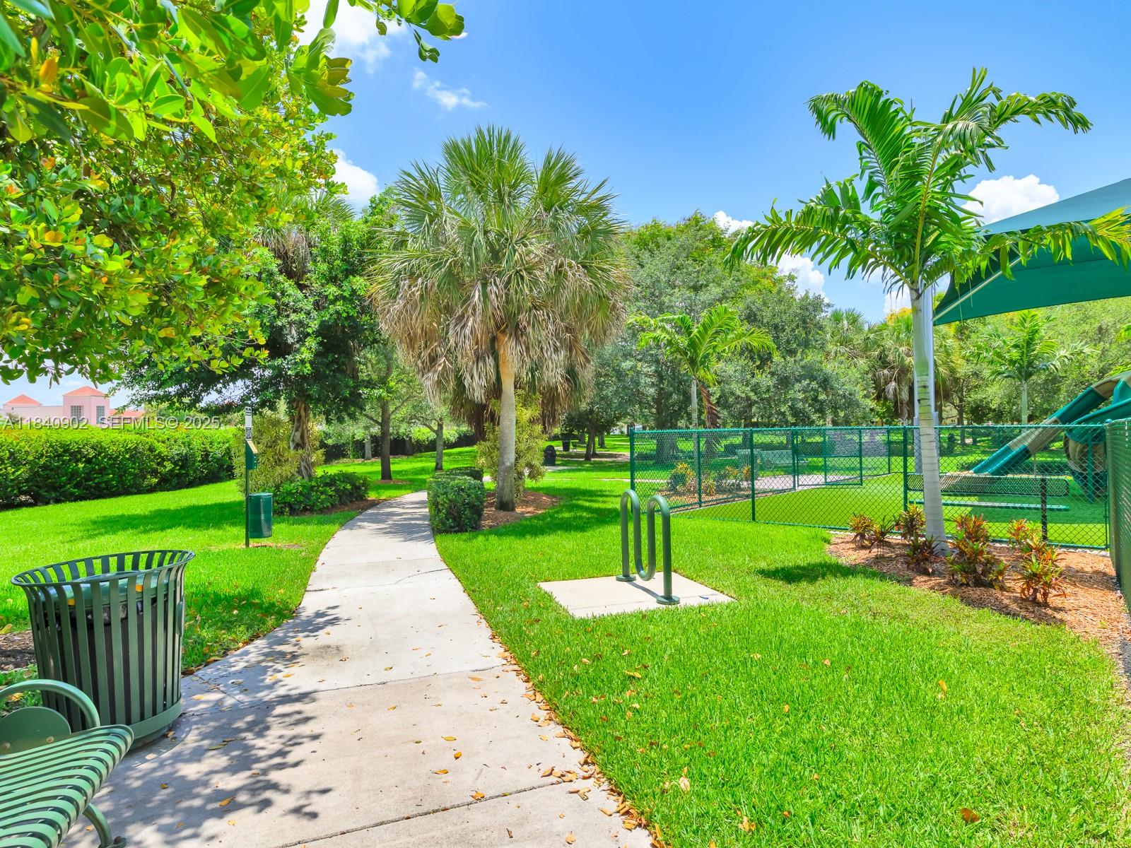 933 Falling Water Road Weston, FL 33326 - Photo 54 of 58 a view of a park with a slide