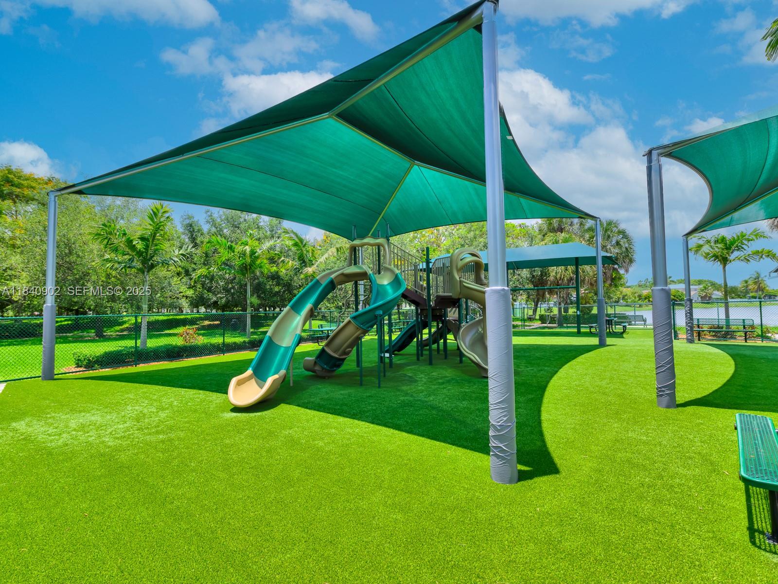 933 Falling Water Road Weston, FL 33326 - Photo 55 of 58 a view of a park with slide