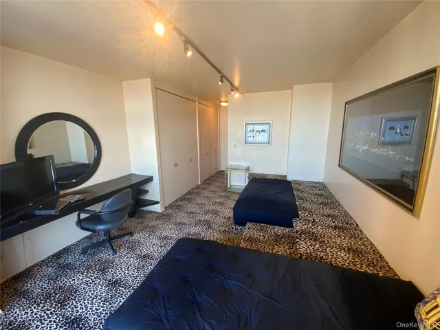 a living room with a couch and a flat screen tv