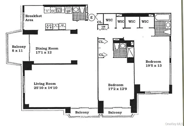 a dining room with furniture and a chandelier