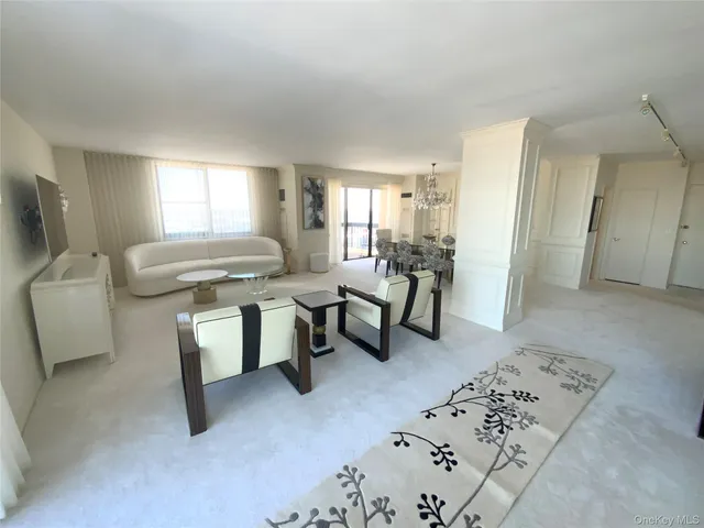 a view of a livingroom with furniture and a couch