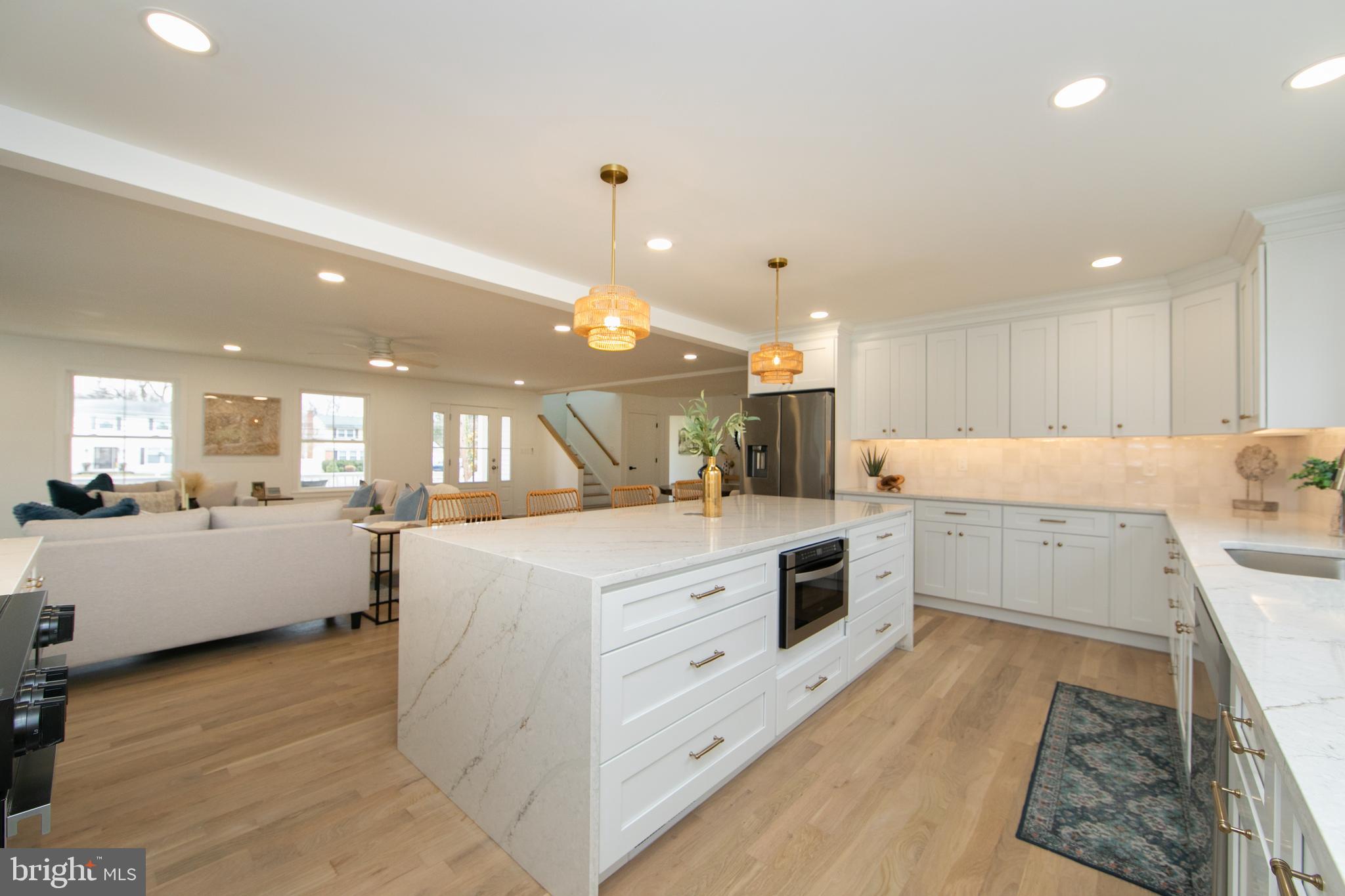 371 Kresson Road Cherry Hill, NJ 08034 - Photo 11 of 51 a large kitchen with lot of counter top and stainless steel appliances