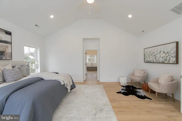 a bed room with a bed and a couch