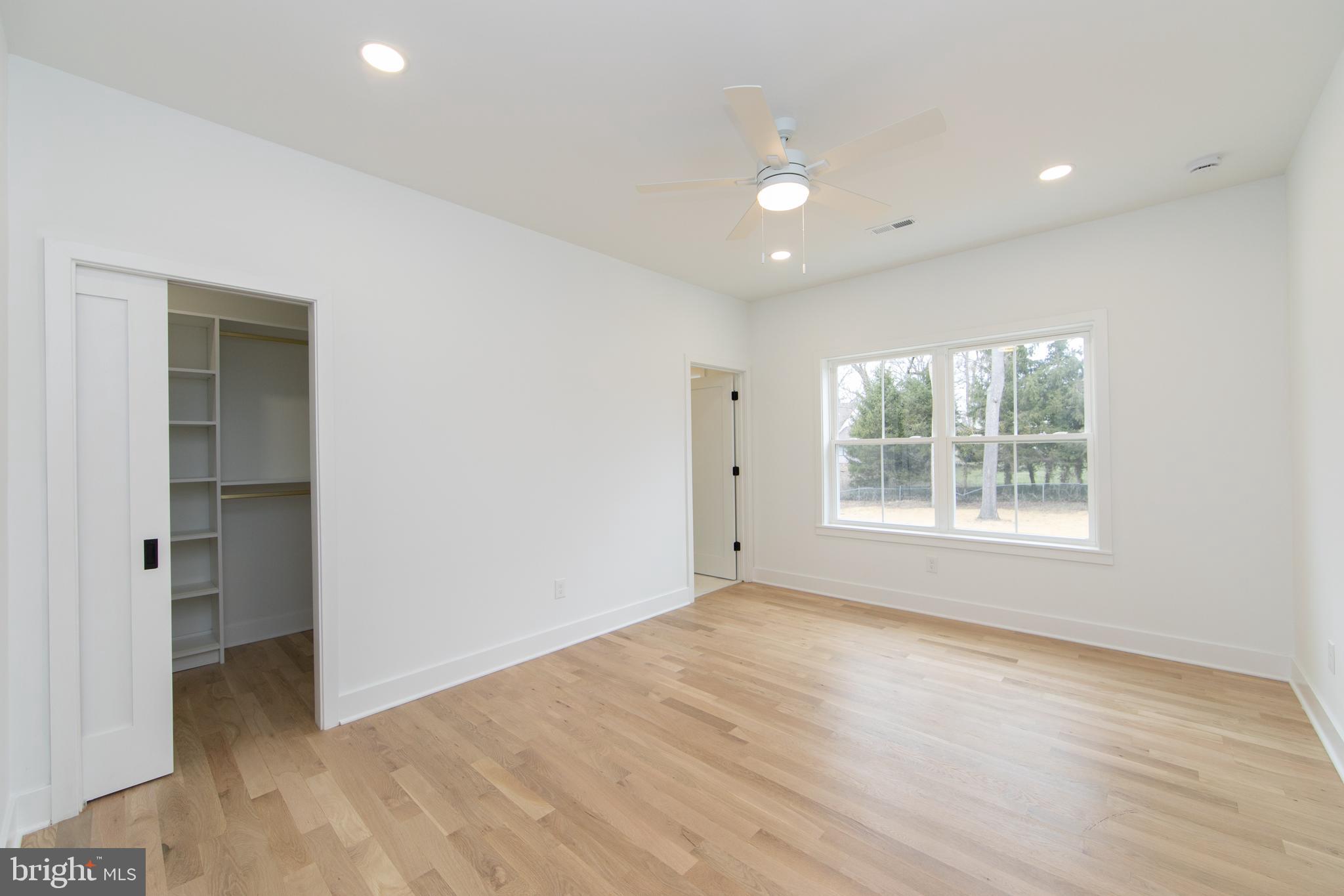 371 Kresson Road Cherry Hill, NJ 08034 - Photo 31 of 51 an empty room with wooden floor and windows