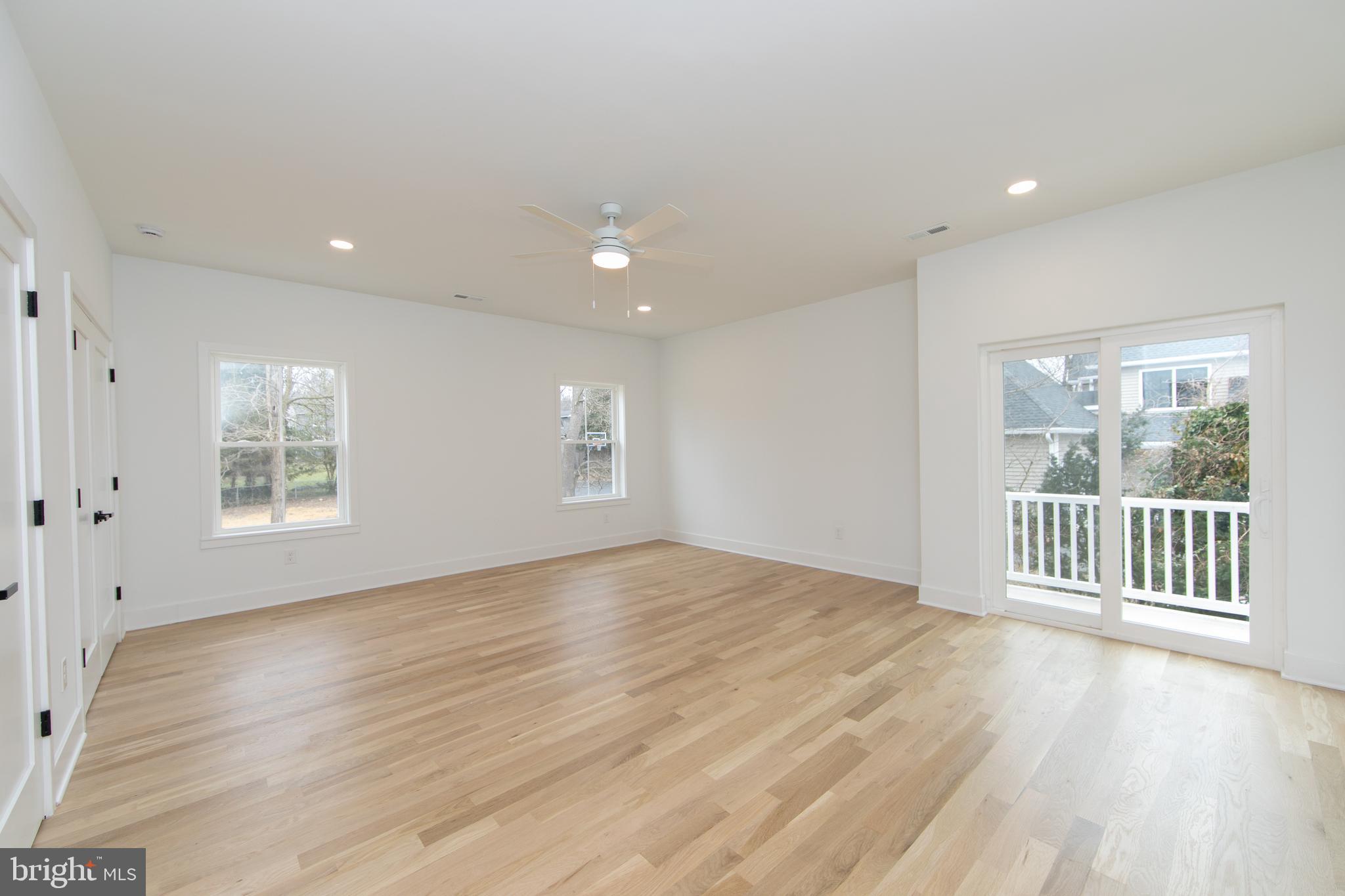 371 Kresson Road Cherry Hill, NJ 08034 - Photo 37 of 51 a view of an empty room with wooden floor and a window