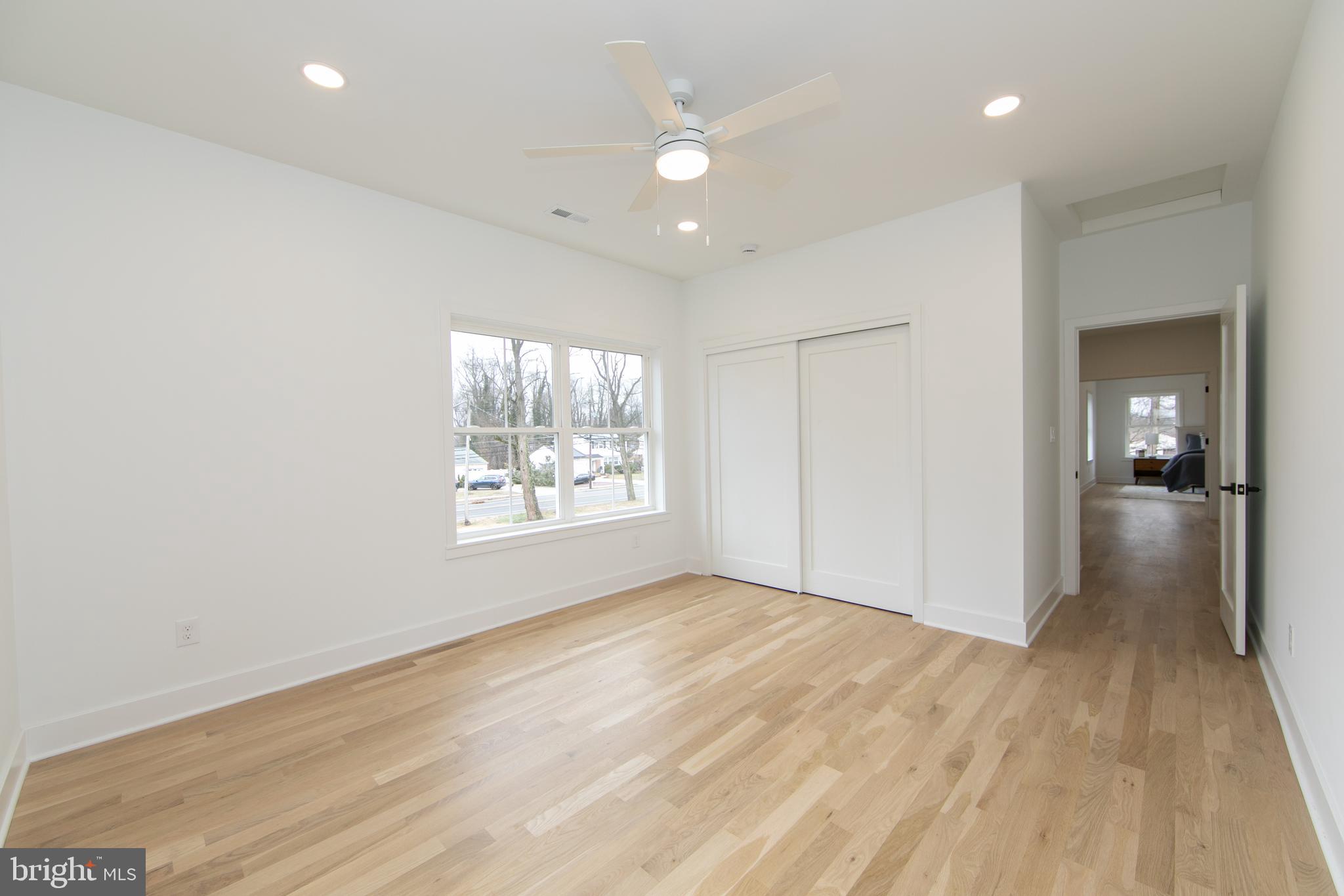 371 Kresson Road Cherry Hill, NJ 08034 - Photo 41 of 51 an empty room with wooden floor and windows